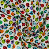 Studio e Fabrics I'm Buggin' Out 5763-1 Tossed Ladybugs White